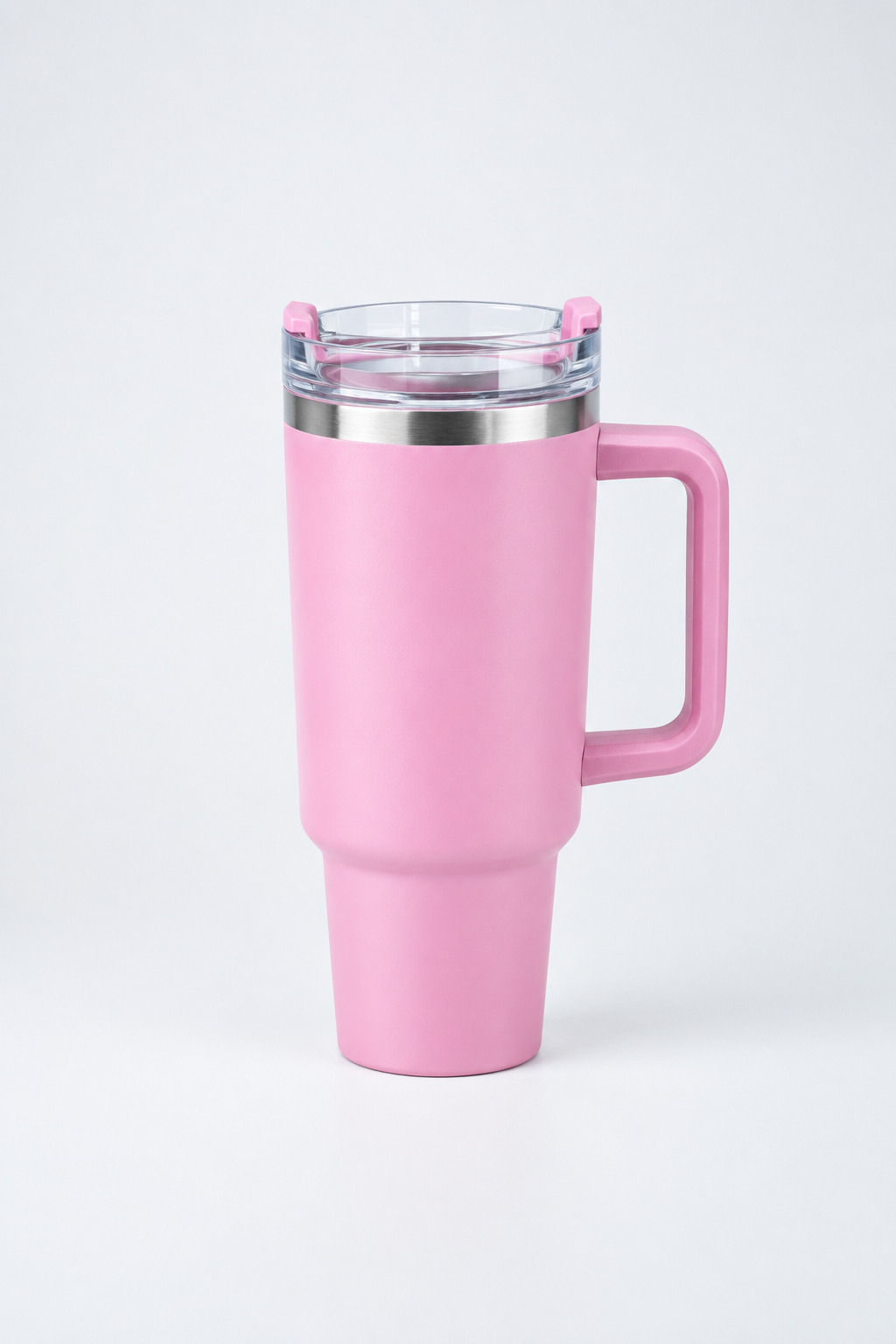 Pink handled tumbler in the reference photo’s studio style