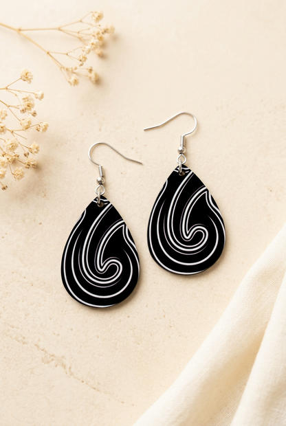 Soft cream jewellery photograph of your koru teardrop earrings